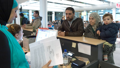 Eine Familie aus Syrien in der Registrierungsstelle für Flüchtlinge in Berlin
